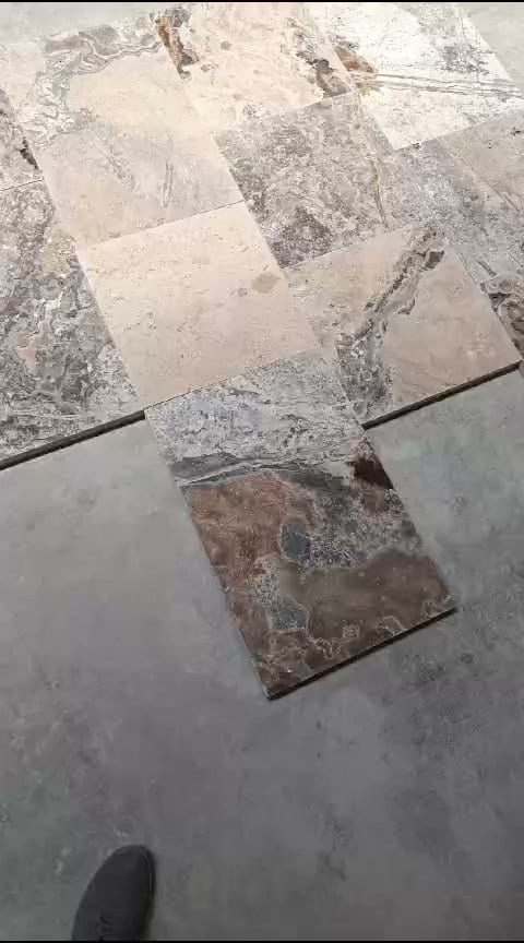French pattern Silver River, 3 cm: grey-brown mottled travertine tiles in French pattern, tumbled