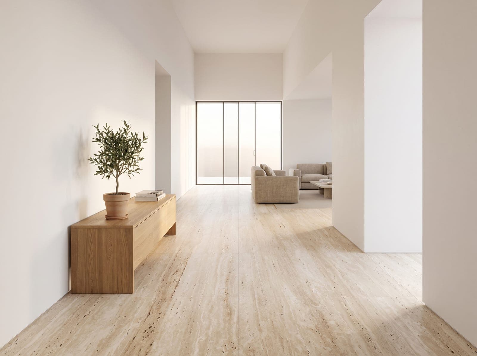 Minimalistische hal met lichte vein-cut travertin in groot formaat, eiken sidetable en olijfboom