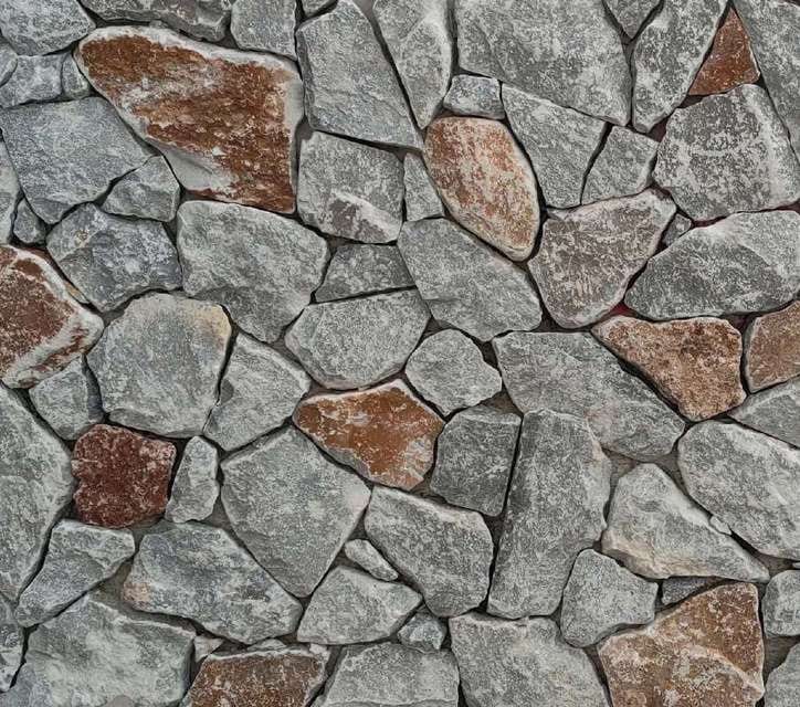 Rockface Mix grey: polygonal pieces in grey, rust and white
