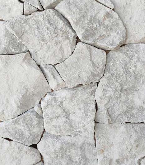 Rockface White Ice: polygonal ice-white marble pieces with cleft face