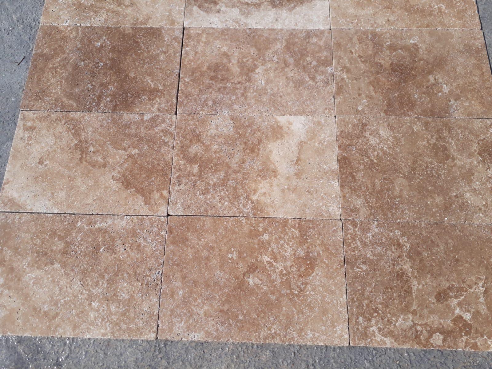 Noce terrace tile 40.6 × 61 cm: walnut-brown travertine terrace tiles, tumbled, laid