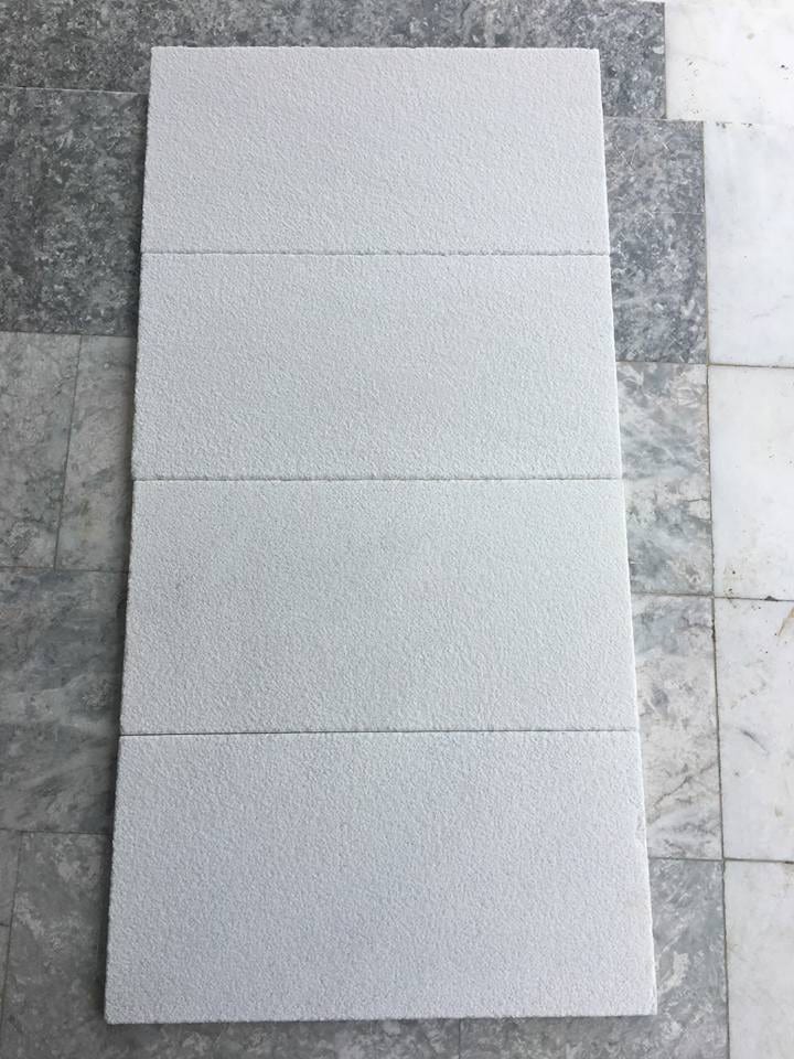 Bianco Ibiza marble pool coping: white marble coping stones with rounded front edge, sandblasted