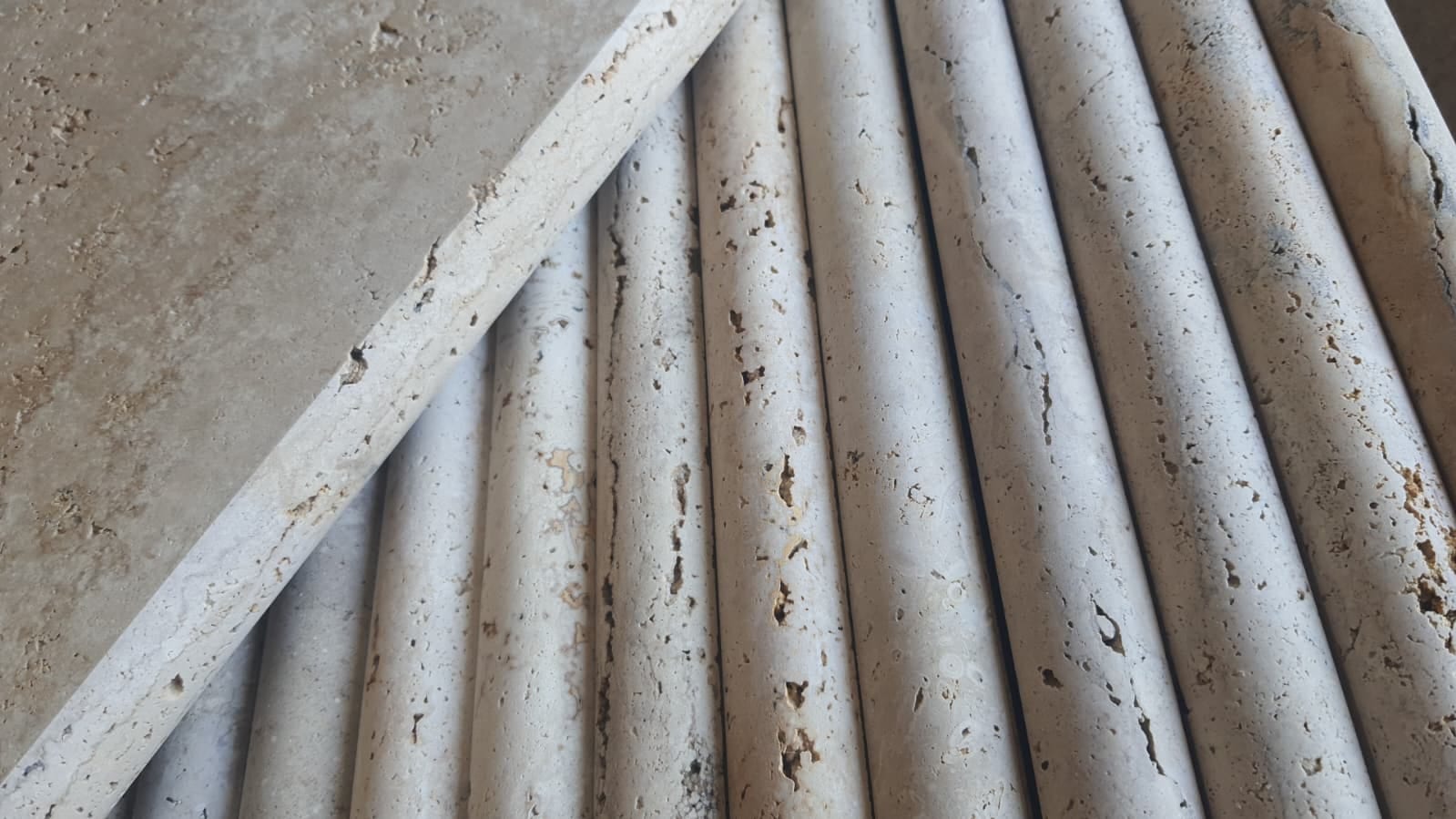 Classic Mix pool coping, long pieces: stack of Classic Mix coping stones with rounded front edge