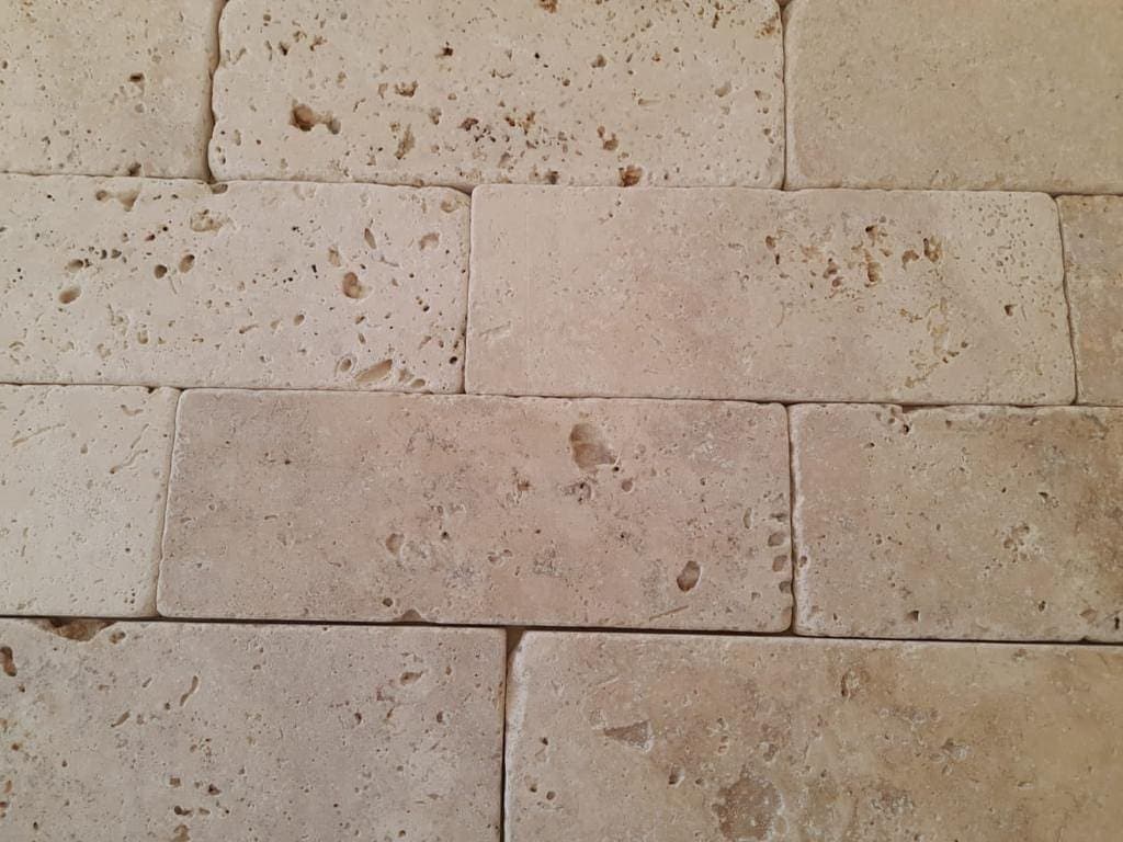 Brick tiles: close-up of the tumbled texture with natural pits